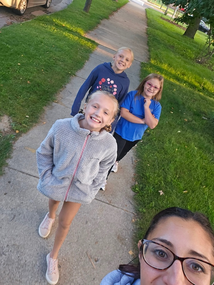 Image of Ms. Draheimโs class walking to the library.